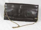 Soft brown leather with gold coloured chain